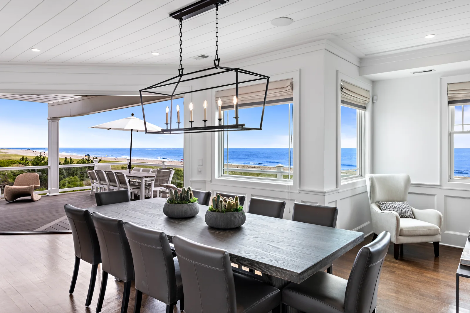 Oceanfront Coastal Living home opening onto the beach